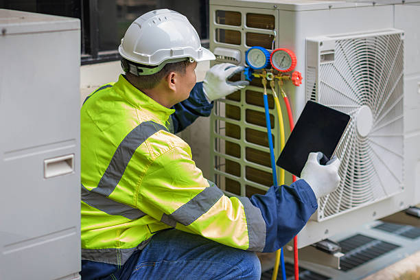 Professional Hvac technician working in Godfrey, IL